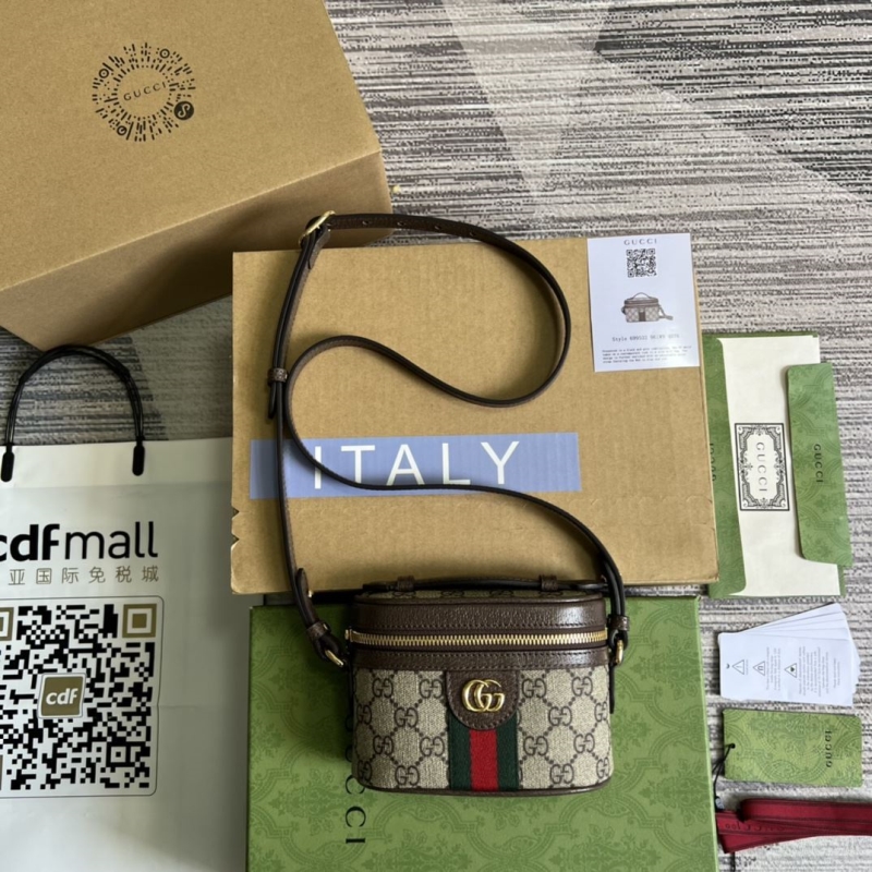 G*u*i cosmetic bags
